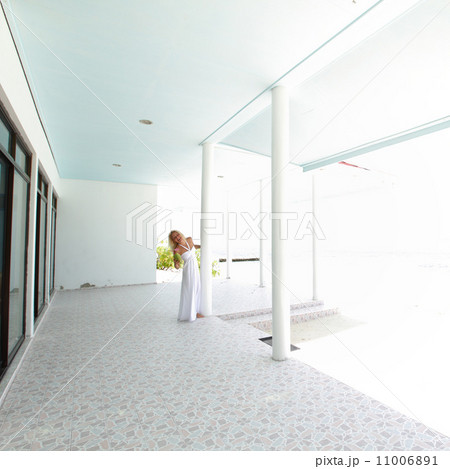 tropic woman on the veranda 11006891