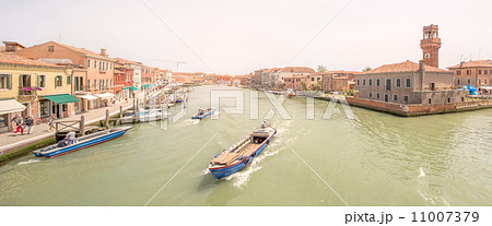 Murano and Burano island, street with glass store Murano and Burano island, street with glass store 11007379