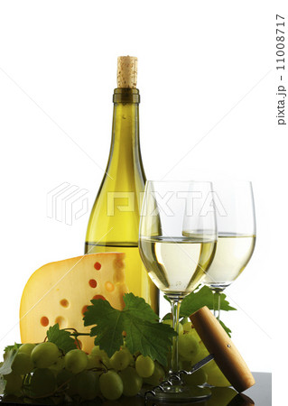 bottle with white wine and glass and grapes 11008717