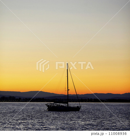Yacht in the sea at sunset Yacht in the sea at sunset 11008936