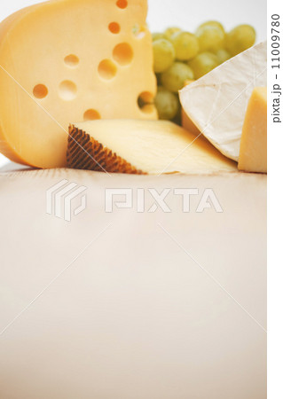 cheese on a wooden table cheese on a wooden table 11009780
