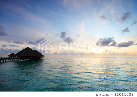 maldivian houses on sunrise 11011603
