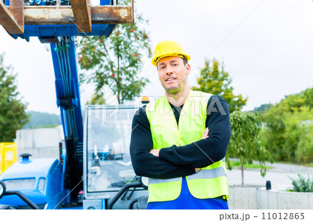 Driver driving construction excavator Driver driving construction excavator 11012865
