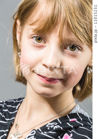 Studio portrait of young beautiful girl 11015231
