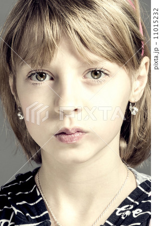 Studio portrait of young beautiful girl 11015232