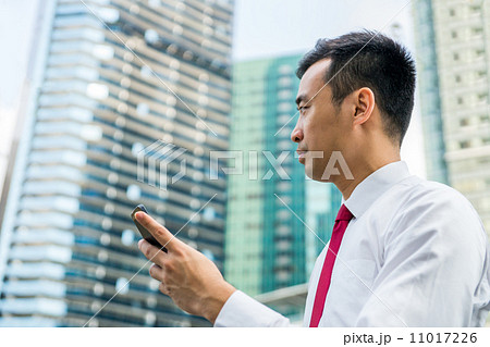 Business man with phone Business man with phone 11017226