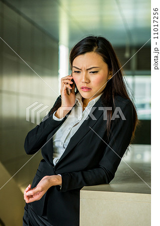 Business woman with phone 11017256