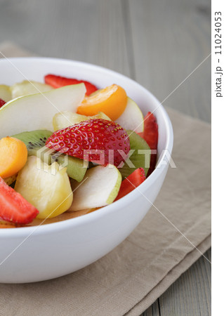 fresh mix fruit salad with strawberry, kiwi and peach 11024053