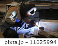 Industrial worker welding in factory 11025994