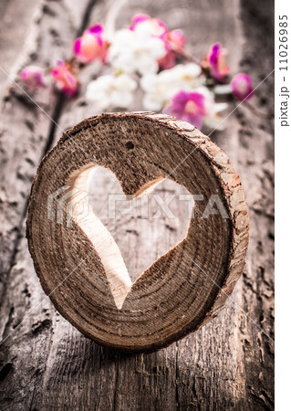 Light heart on rustic wooden background Light heart on rustic wooden background 11026985