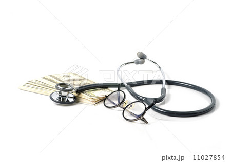 Close up stethoscope and Hundred dollar bills Close up stethoscope and Hundred dollar bills 11027854