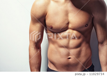 Muscular torso of young man Muscular torso of young man 11029734