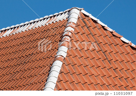 Red roof tiles with sky 11031097