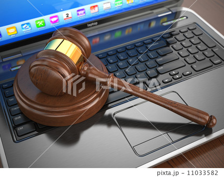 Online internet auction. Gavel on laptop. 11033582