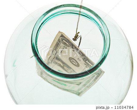 top view of catching last dollar from glass jar 11034784
