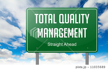 Total Quality Management on Green Highway Signpost. 11035689