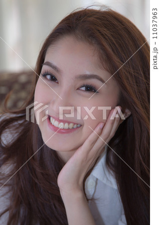 Asian woman in the bedroom. Asian woman in the bedroom. 11037963