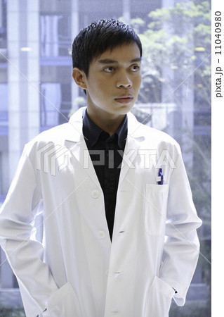 Asian professional with lab coat indoor 11040980
