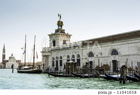 Ancient buildings and boats in the channel in Venice Ancient buildings and boats in the channel in Venice 11041658