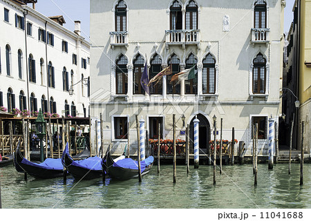 Ancient buildings and boats in the channel in Venice Ancient buildings and boats in the channel in Venice 11041688