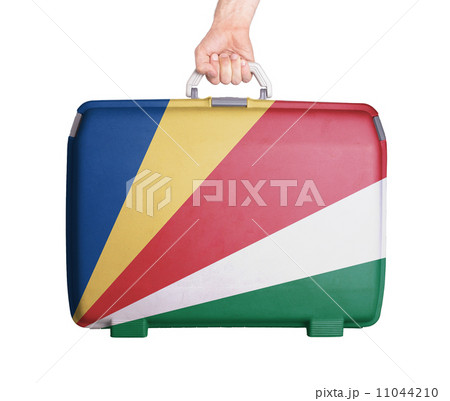 Used plastic suitcase with stains and scratches 11044210