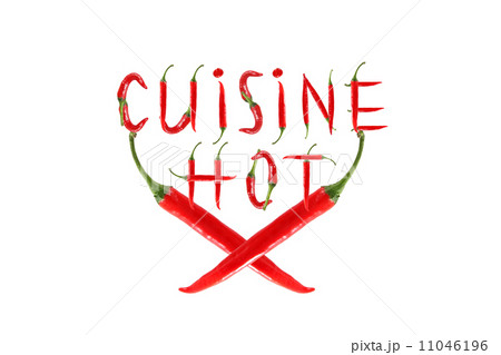CUISINE HOT text composed of chili peppers. Isolated on white ba 11046196