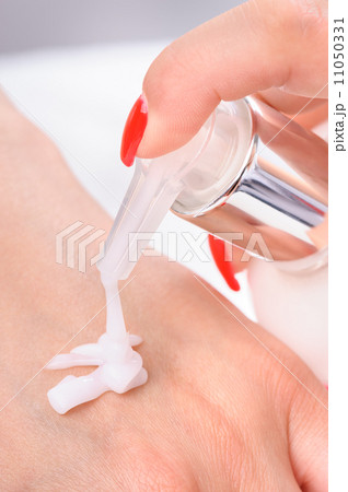 hands skin care - cream applying hands skin care - cream applying 11050331