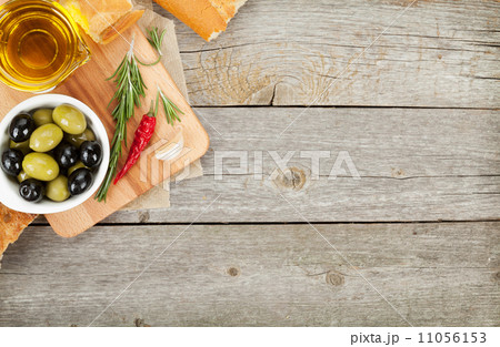 Italian food appetizer of olives, bread and spices 11056153