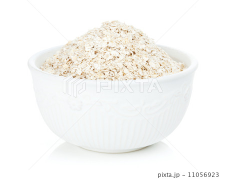Oat flakes in bowl Oat flakes in bowl 11056923