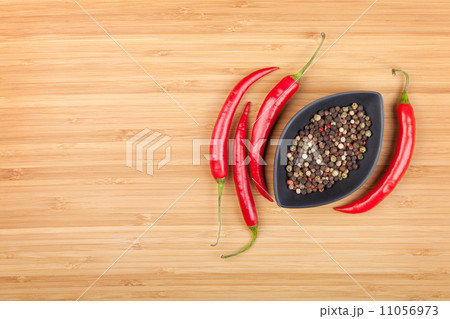 Red hot peppers and peppercorn 11056973