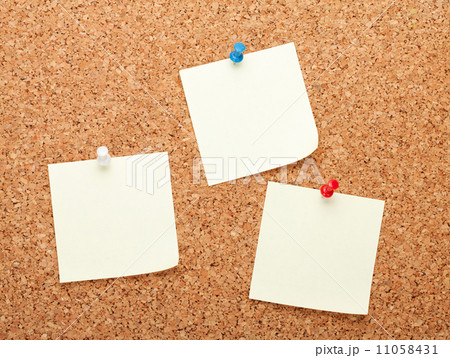 Blank postit notes on cork notice board Blank postit notes on cork notice board 11058431