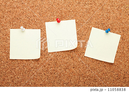 Blank postit notes on cork notice board Blank postit notes on cork notice board 11058838