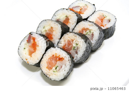 Japanese rolls in a restaurant with fish and vegetables Japanese rolls in a restaurant with fish and vegetables 11065463