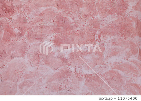 Closeup red painted stone wall texture with plaster Closeup red painted stone wall texture with plaster 11075400