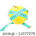 Measure tape on yellow apple 11077376
