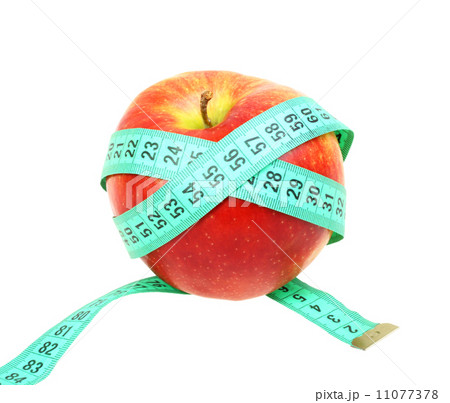 Measure tape on red apple 11077378
