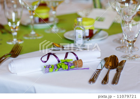 Elegant table set in lilac and green for wedding or event party 11079721