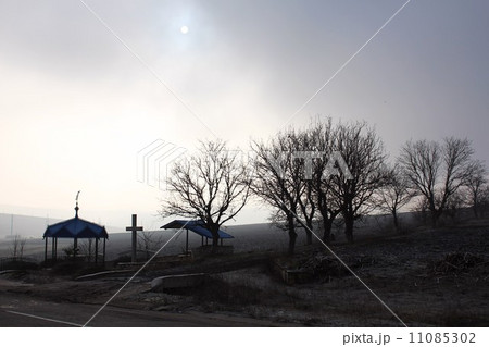 Sun in the haze (gauze) and cross 11085302