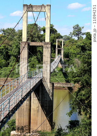 suspension bridge over river in rainforest suspension bridge over river in rainforest 11094251