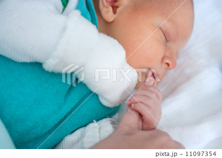 Newborn baby boy only few hours old 11097354