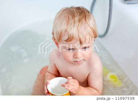 Adorable toddler taking bath 11097539