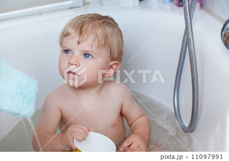 Adorable toddler taking bath Adorable toddler taking bath 11097991