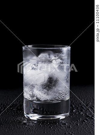 shot of cold sparkling alcohol 11100436