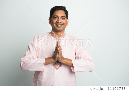 traditional young indian male with Pranamasana greetings sign on traditional young indian male with Pranamasana greetings sign on 11101733
