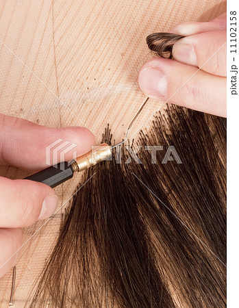 Professional Wig-maker - Closeup of Working Tool Professional Wig-maker - Closeup of Working Tool 11102158