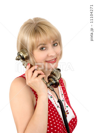 The beautiful woman with ancient phone The beautiful woman with ancient phone 11104271