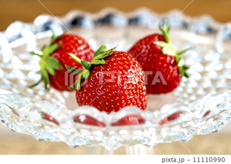 strawberries in a glass bowl strawberries in a glass bowl 11110990
