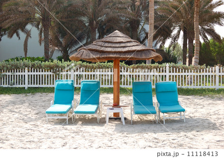 Beach and sunbeds at the luxury hotel, Ajman, UAE 11118413