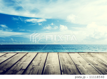 tropical beach and wooden platform tropical beach and wooden platform 11118540