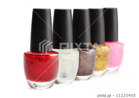 colorful nail polish set on white background isolated 11125450